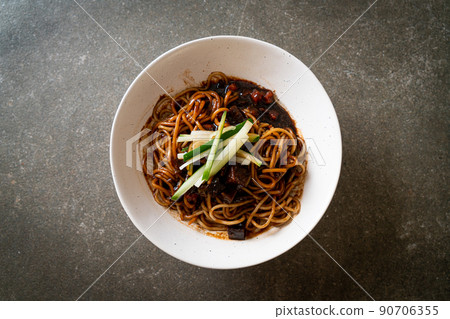 Jajangmyeon or JJajangmyeon is Korean Noodle with Black Sauce Jajangmyeon or JJajangmyeon is Korean Noodle with Black Sauce 90706355