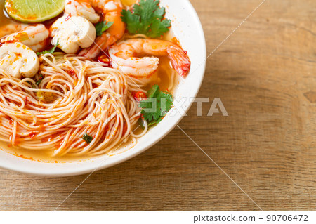 noodles with spicy soup and shrimps (Tom Yum Kung) 90706472