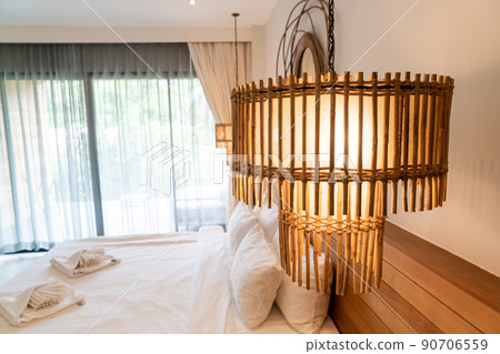 beautiful hanging lamp decoration on side bed 90706559