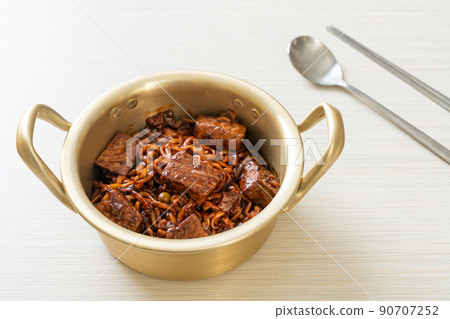 Jjapaguri or Chapaguri, Korean Black Beans Spicy Noodles with Beef 90707252