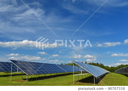 Solar power plant - concept for electricity and ecological industry. High energy prices. Beautiful landscape and sunny day with blue sky.. photovoltaic power plant Solar power plant - concept for electricity and ecological industry. High energy prices. Beautiful landscape and sunny day with blue sky.. photovoltaic power plant 90707338