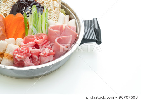 Budae Jjigae or Budaejjigae (Army stew or Army base stew). It is loaded with Kimchi, spam, sausages, ramen noodles and much more Budae Jjigae or Budaejjigae (Army stew or Army base stew). It is loaded with Kimchi, spam, sausages, ramen noodles and much more 90707608