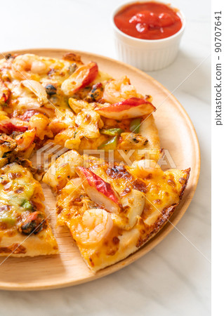 seafood pizza on wood tray 90707641