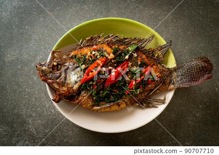 Fried Tilapia Fish with Basil chili garlic sauce 90707710