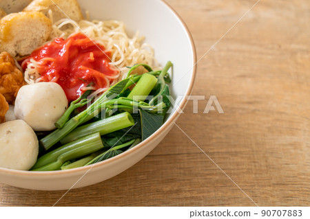 egg noodles with fish balls and shrimp balls in pink sauce, Yen Ta Four or Yen Ta Fo egg noodles with fish balls and shrimp balls in pink sauce, Yen Ta Four or Yen Ta Fo 90707883