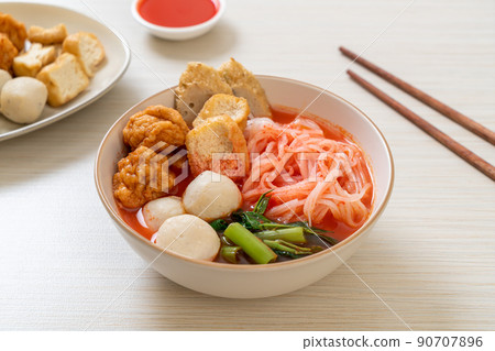 small flat rice noodles with fish balls and shrimp balls in pink soup, Yen Ta Four or Yen Ta Fo 90707896