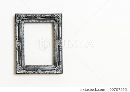 empty picture frame on white wall background empty picture frame on white wall background 90707953