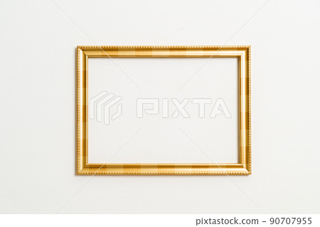 empty picture frame on white wall background empty picture frame on white wall background 90707955