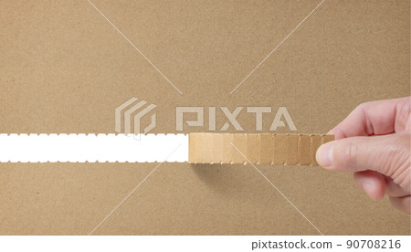 Hand background texture with open cardboard zipper Hand background texture with open cardboard zipper 90708216