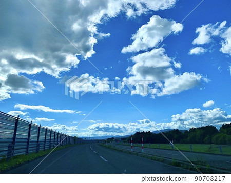 A wide sky after the rain from the passenger seat A wide sky after the rain from the passenger seat 90708217