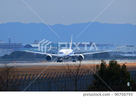 Osaka International Airport passenger plane takeoff and landing Osaka International Airport passenger plane takeoff and landing 90708793
