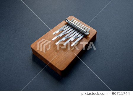Traditional wooden kalimba isolated on black 90711744