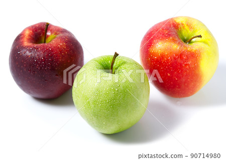 Three apples with water drops. Delicious appetizing beautiful fresh green and red apples on a white background. Three apples with water drops. Delicious appetizing beautiful fresh green and red apples on a white background. 90714980