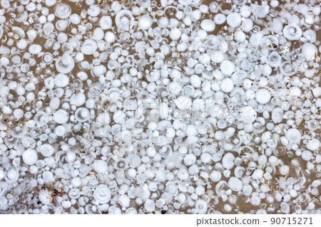 Background of hailstones in the water, a lot of hailstones Background of hailstones in the water, a lot of hailstones 90715271