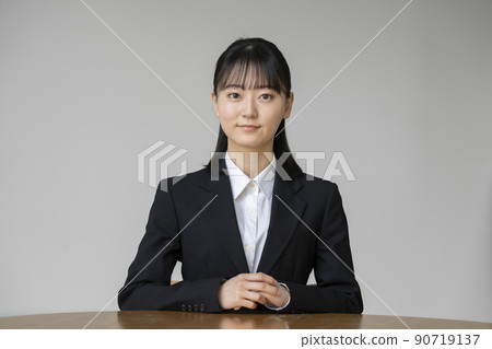 Young woman in a suit, job hunting student, Freshers image, white background portrait 90719137