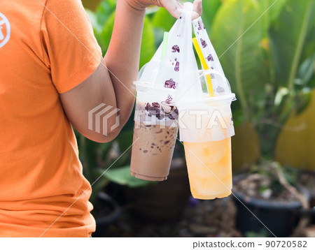 ice juice in plastic take away cups ice juice in plastic take away cups 90720582