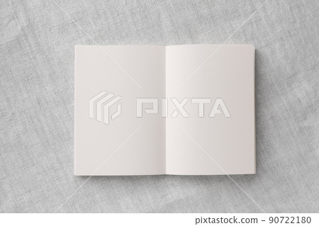 An unwritten double-page spread pink notebook placed on top of gray An unwritten double-page spread pink notebook placed on top of gray 90722180