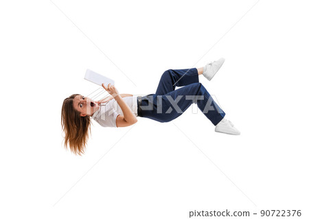 Portrait of young woman, employee in official suit falling down isolated over white studio background. Bad time management 90722376