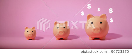 Piggy bank isolated on pink background. Saving money concept. Piggy bank isolated on pink background. Saving money concept. 90723370