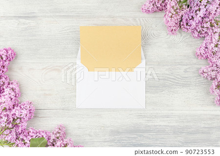 Notebook with pen and lilac. 90723553