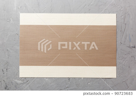 Top view of brown tablecloth for food on cement background. Empty space for your design 90723683