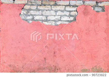 Texture of old brick wall and cracked stucco of pink color Texture of old brick wall and cracked stucco of pink color 90723822