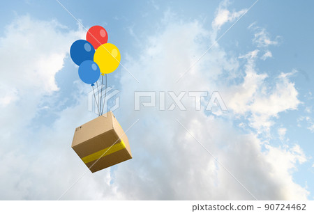 Parcel box delivered by colored baloons in the sky Parcel box delivered by colored baloons in the sky 90724462