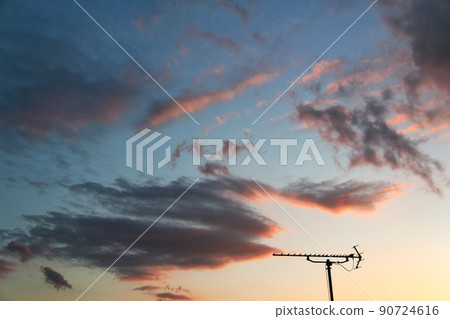 Early summer dusk and antenna 90724616