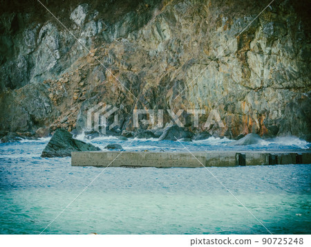 Rough sea and fishing port coast Rough sea and fishing port coast 90725248