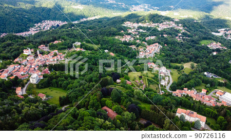 Aerial view of The Alpine foothills in Piedmont region. Aerial view of The Alpine foothills in Piedmont region. 90726116