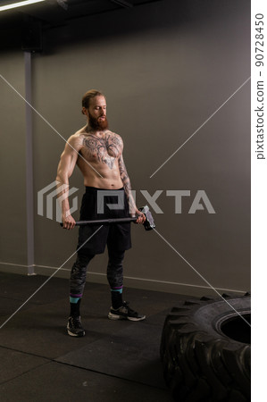 Tire sledge hammer muscular wheel man hitting exercise workout strength, concept equipment strong from athletic from sportswear concentration, male cross. Energy cardio adult, 90728450