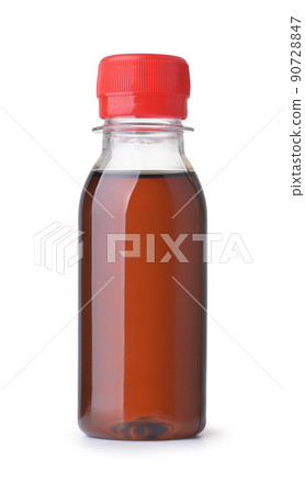 Plastic bottle of caramel syrup 90728847