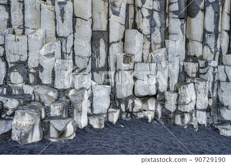 Beautiful view of basalt rock columns formation on seashore of Reynisfjara Beach Beautiful view of basalt rock columns formation on seashore of Reynisfjara Beach 90729190