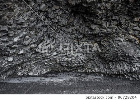 Beautiful basalt rock columns formation on black seashore of Reynisfjara Beach Beautiful basalt rock columns formation on black seashore of Reynisfjara Beach 90729204