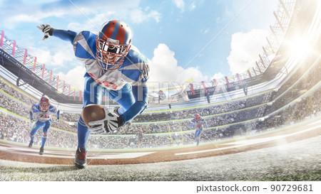 Touchdown in football. Young agile american football player running fast towards goal line. Sportsman in action. Sports emotions 90729681