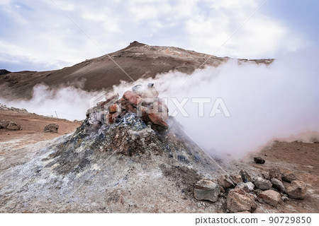 Steam emitting from fumarole in geothermal area of Hverir at Namafjall Steam emitting from fumarole in geothermal area of Hverir at Namafjall 90729850
