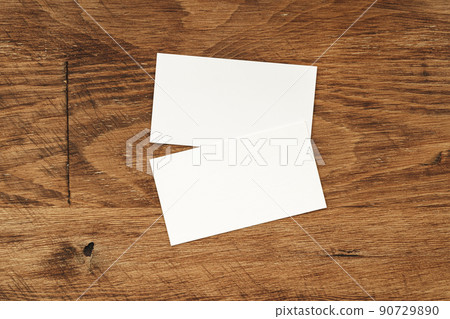 Stacks of businesscards with copy space on wooden background 90729890