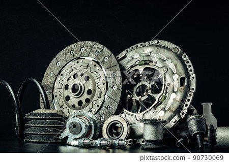 Close up of new car parts on black background 90730069