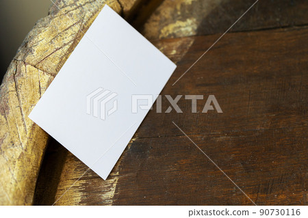 Blank white business cards on wooden background. Blank white business cards on wooden background. 90730116