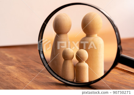 Small wooden figures of family members. Family relationship symbol 90730271