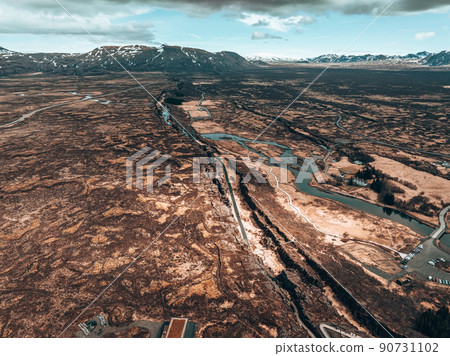 The well visible tectonic plate at Thingvellir National Park in Iceland. 90731102