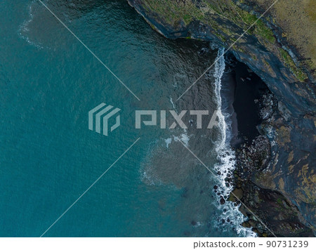 Iceland black sand beach with huge waves at Reynisfjara Vik. 90731239