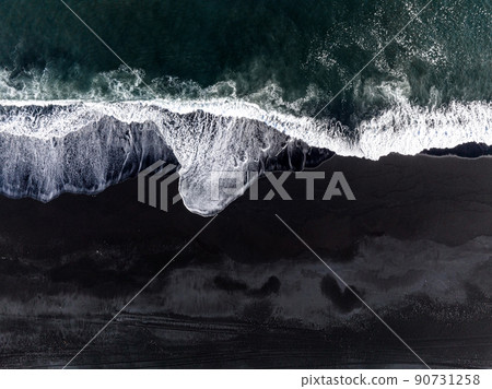 Aerial view of the Iceland coastline by the black beach. 90731258