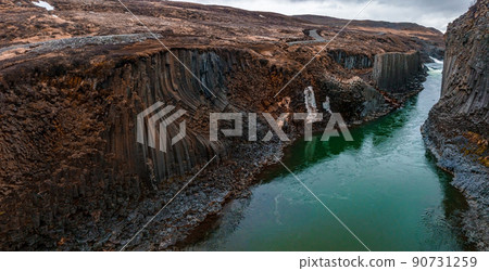 Epic view of the studlagil basalt canyon, Iceland. 90731259
