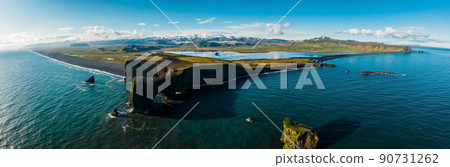 Aerial view of the Iceland coastline by the black beach. 90731262