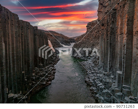 Epic view of the studlagil basalt canyon, Iceland. 90731263