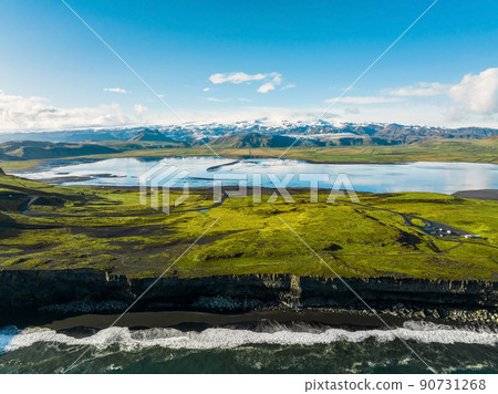 Aerial view of the Iceland coastline by the black beach. 90731268
