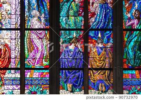 Stained glass windows of St. Vitus Cathedral in the Prague, Czech Republic 18 May 2022 90732970