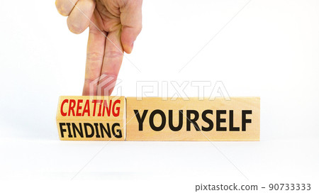 Finding or creating yourself symbol. Businessman turns wooden cubes and changes words Finding yourself to Creating yourself. Beautiful white background, copy space. Business creating yourself concept. Finding or creating yourself symbol. Businessman turns wooden cubes and changes words Finding yourself to Creating yourself. Beautiful white background, copy space. Business creating yourself concept. 90733333