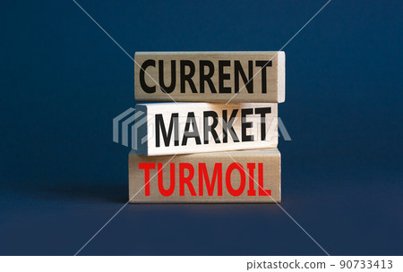 Current market turmoil symbol. Concept words Current market turmoil on wooden blocks on a beautiful grey table grey background. Business, finacial current market turmoil concept. Copy space. 90733413